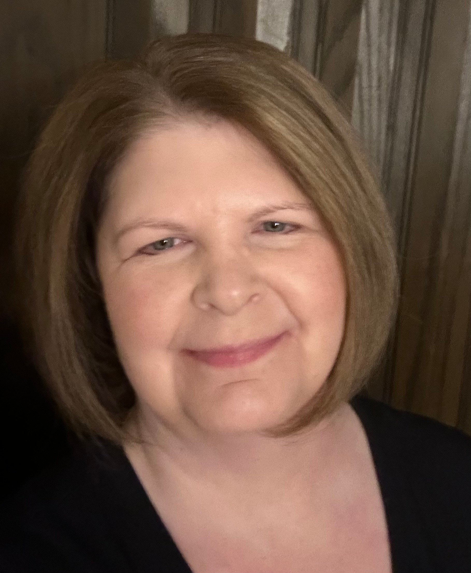 Pam Johnsons smiling face.